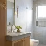 image of a bathroom with a walkin shower glass partition